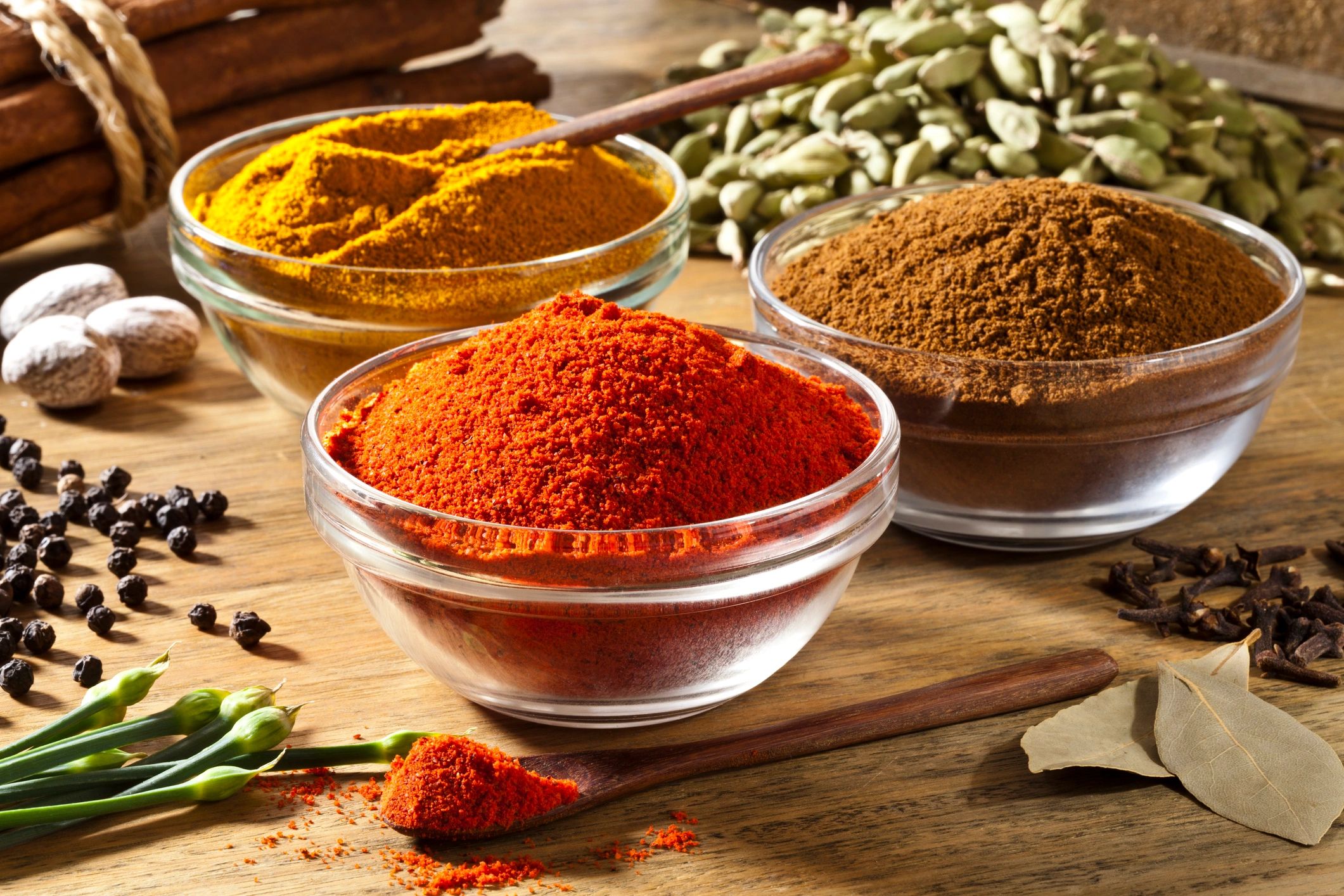 Assorted ground spices in bowls